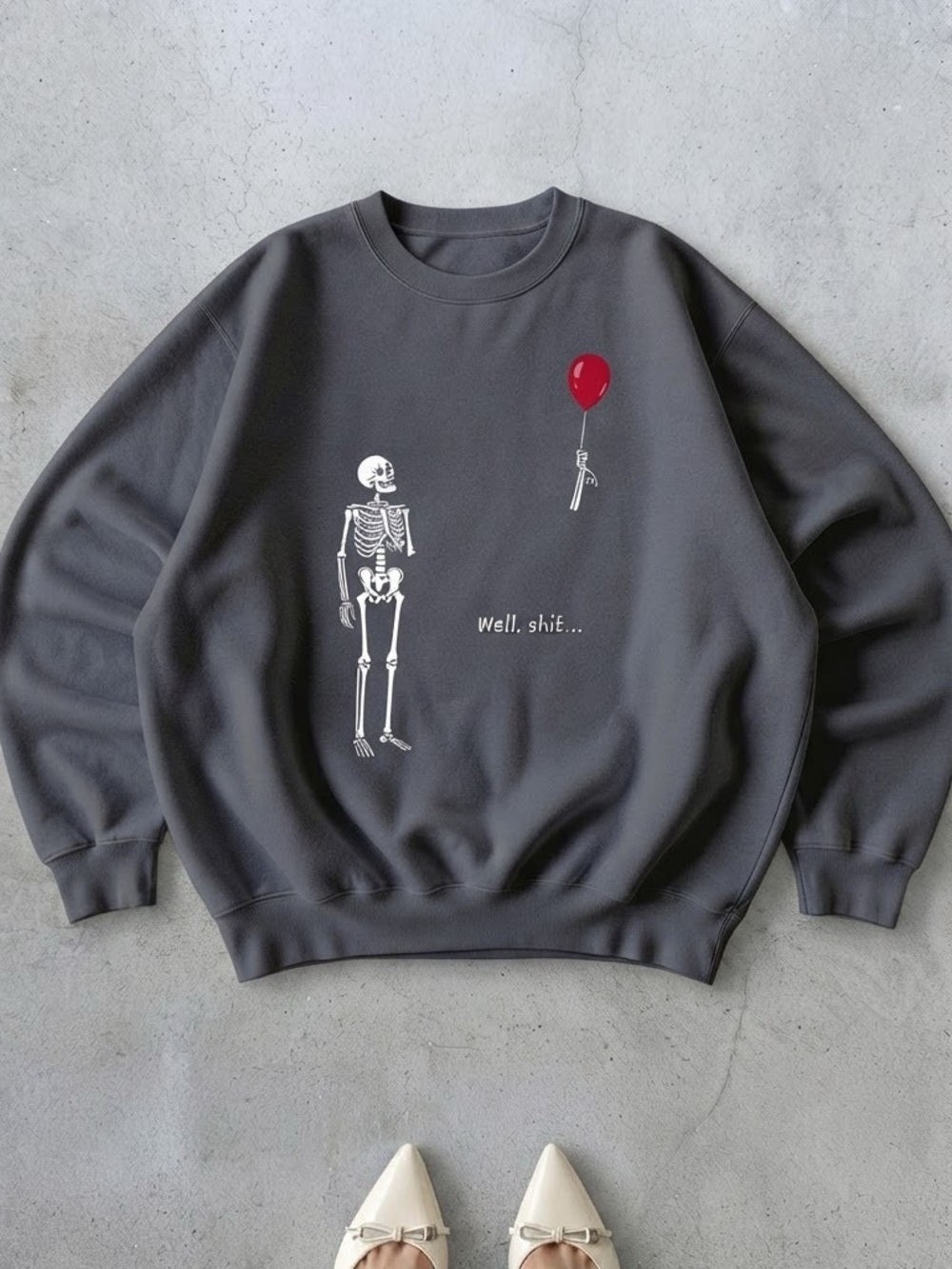 Gildan Charcoal Crewneck Sweatshirt with
Skeleton & Red Balloon Graphic